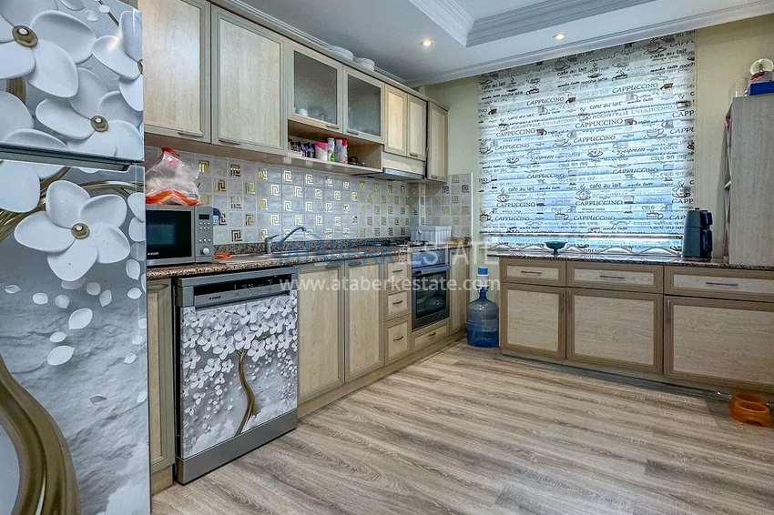 Приобрести Пентхаус-дуплекс в центре Алании – мебель, вид на море и горы, в 450 метрах от пляжа 11 