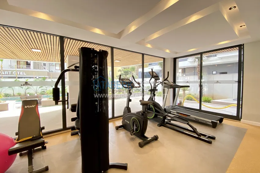 Двухкомнатная квартира в современном комплексе – центр Алании 11 