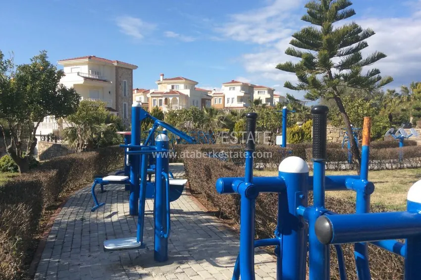 Вилла в Авсалларе - трехэтажный таунхаус на два хозяина с частным садиком  11 