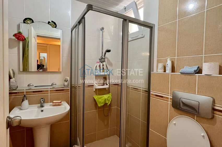 Приобрести Трехкомнатная квартира в Махмутларе с мебелью в комплексе на первой береговой линии 10 