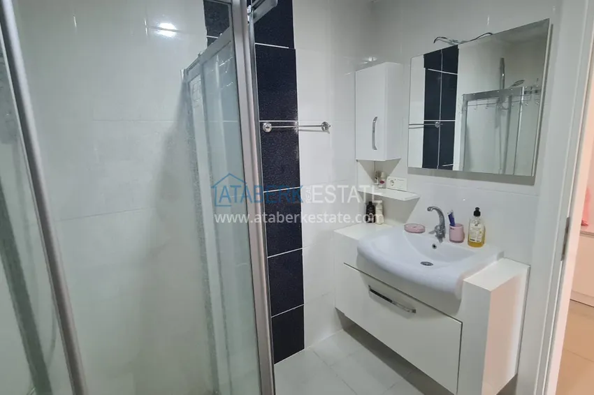 Приобрести Квартира 2+1 с мебелью, застеклённым балконом и видом на горы, район Махмутлар – Алания 11