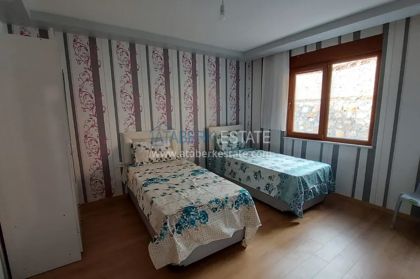 Приобрести Двухэтажная смежная вилла с панорамным видом в районе Бекташ, Алания. Недвижимость подходит для гражданства 9 