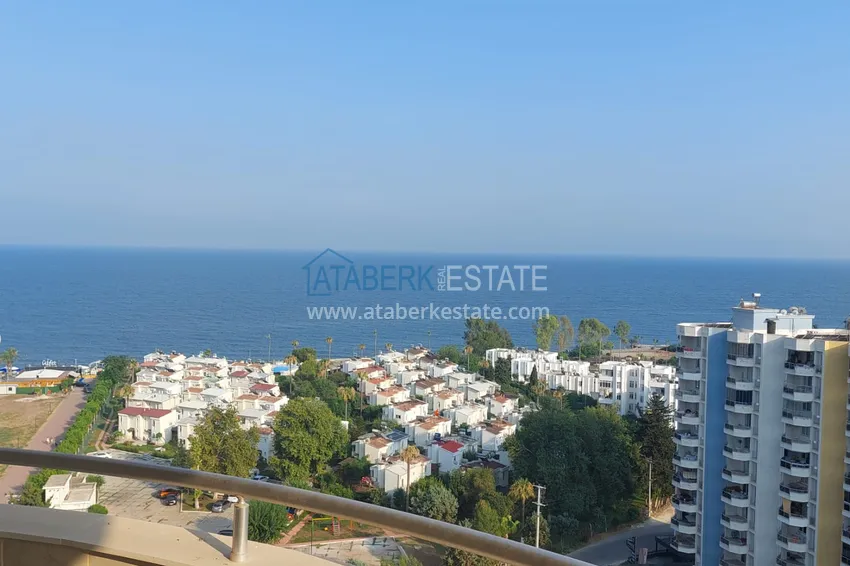 Приобрести Трехкомнатная квартира с мебелью и панорамным видом на море в Чешмели, Мерсин 12 