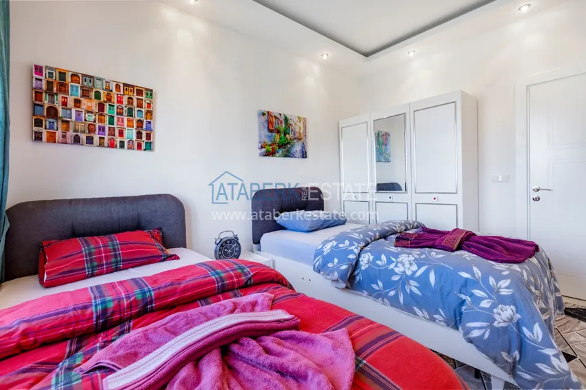 Приобрести Трехкомнатная квартира под ключ в Махмутларе, с видом на горы и застекленным балконом 13 