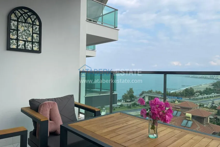 Приобрести Двухкомнатная квартира с мебелью и видом на море. Район Каргыджак, Алания 13 