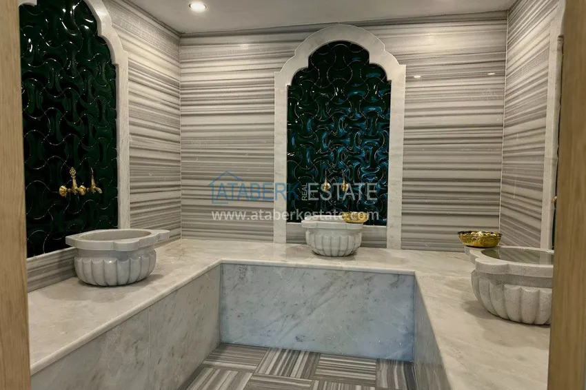 Двухкомнатная квартира в современном комплексе – центр Алании 13 