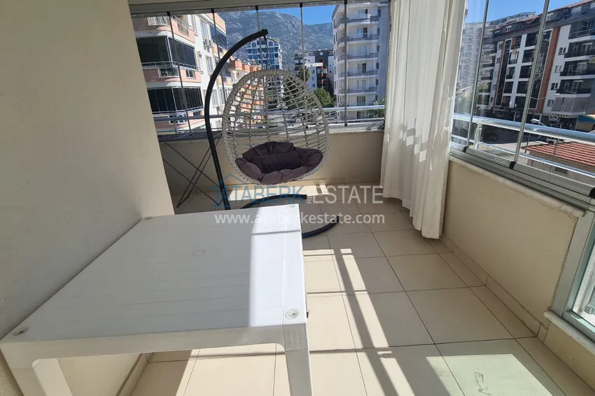 Приобрести Квартира 2+1 с мебелью, застеклённым балконом и видом на горы, район Махмутлар – Алания 13