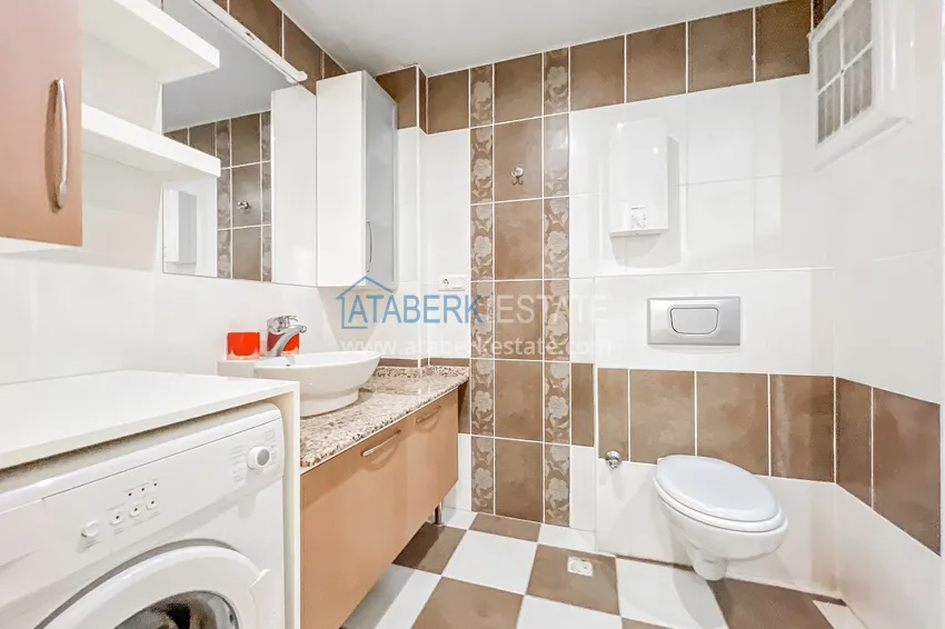 Приобрести Квартира под ключ с застекленным балконом в Махмутларе на центральной улице, в 150 метрах от моря 15