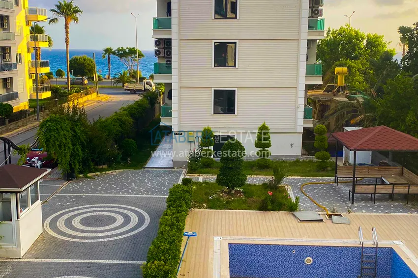 Приобрести Трехкомнатная квартира с видом на море в Алании, район Кестель - вторая линия от моря 14 