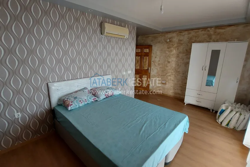 Приобрести Двухэтажная смежная вилла с панорамным видом в районе Бекташ, Алания. Недвижимость подходит для гражданства 12 