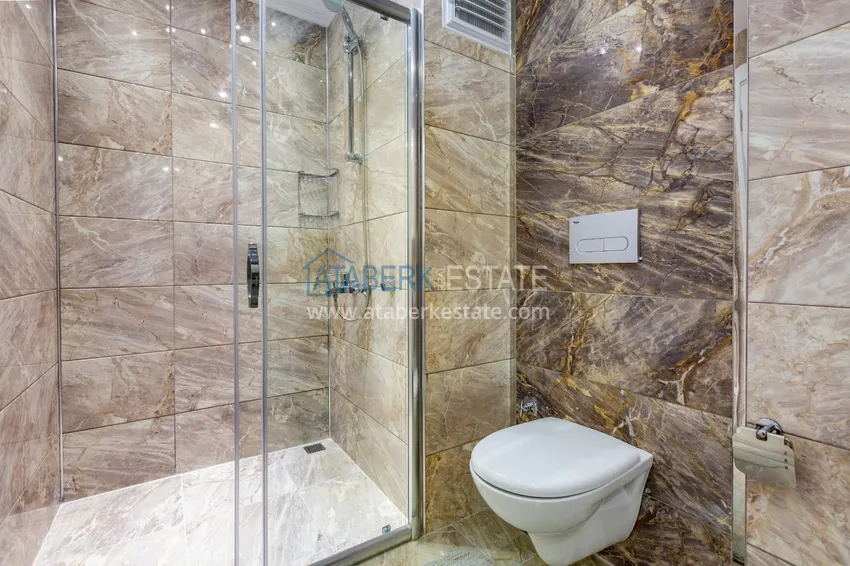 Приобрести Трехкомнатная квартира под ключ в Махмутларе, с видом на горы и застекленным балконом 16 