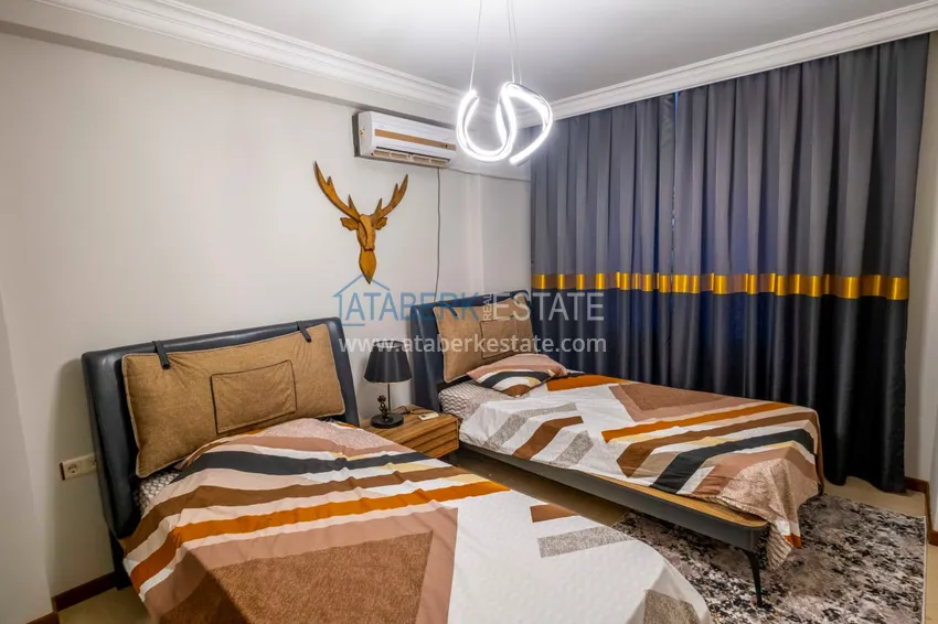 Приобрести Трёхкомнатная квартира в комплексе на первой береговой, район Махмутлар – Алания 11 