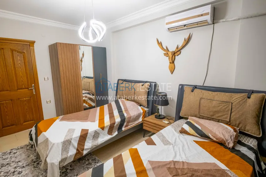 Приобрести Трёхкомнатная квартира в комплексе на первой береговой, район Махмутлар – Алания 12 