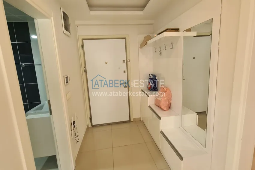 Приобрести Квартира 2+1 с мебелью, застеклённым балконом и видом на горы, район Махмутлар – Алания 1