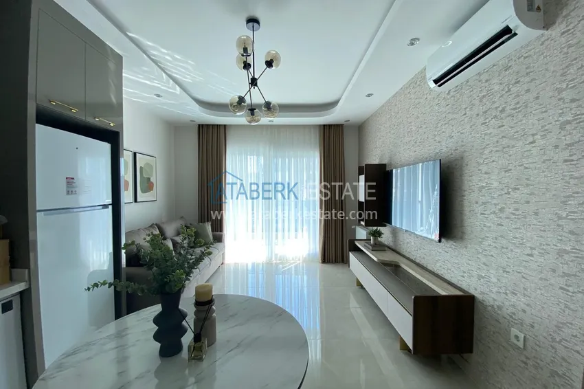 Приобрести Двухкомнатная квартира под ключ с застекленным балконом - Махмутлар, р-н субботнего рынка 1