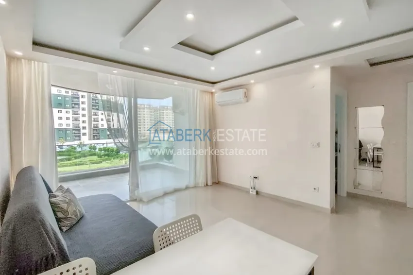 Приобрести Квартира 1+1 в современном жилом комплексе с инфраструктурой – район Махмутлар, Алания 1 