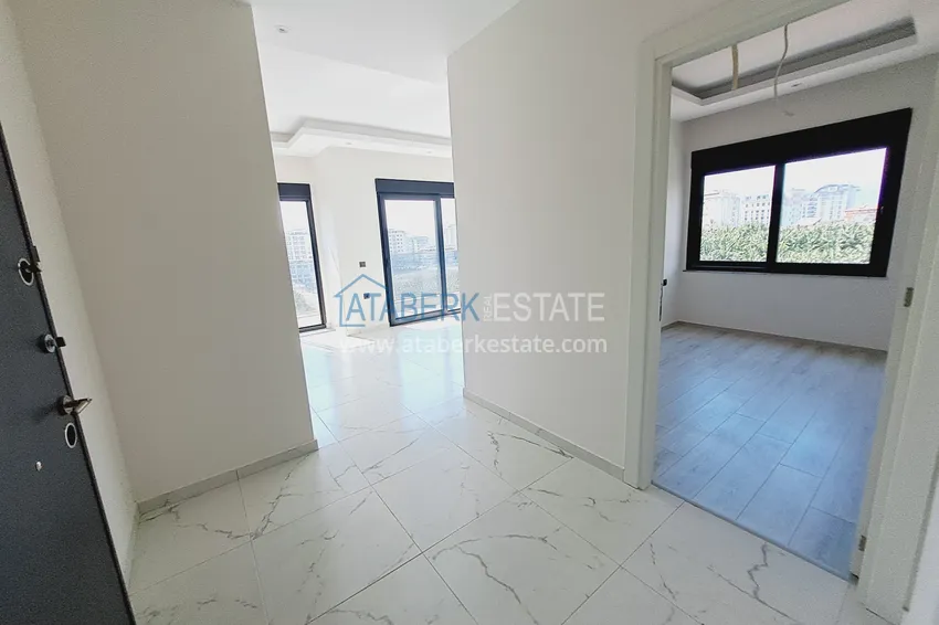 Приобрести Двухкомнатная квартира от инвестора в строящемся жилом комплексе - Махмутлар 1 