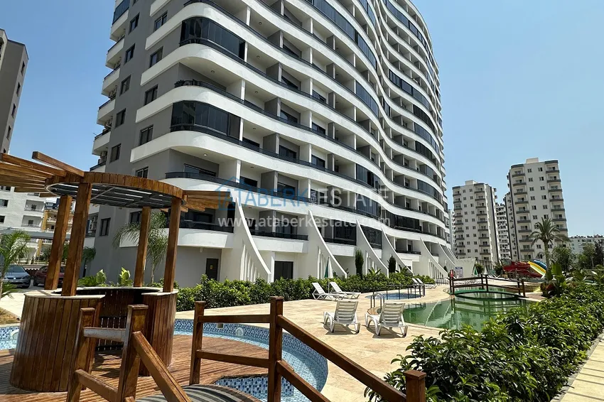 Двухкомнатная квартира в Мерсине, район Арпачбахшиш в 300 метрах от моря 2 