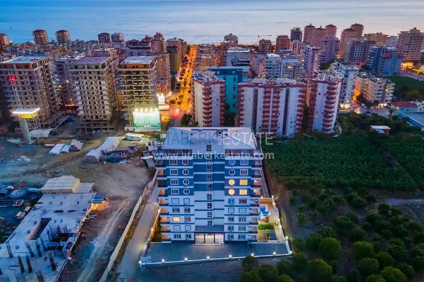 Трехкомнатная квартира под ключ в Махмутларе, с видом на горы и застекленным балконом 1 