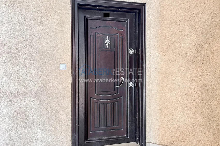 Приобрести Квартира под ключ с застекленным балконом в Махмутларе на центральной улице, в 150 метрах от моря 1