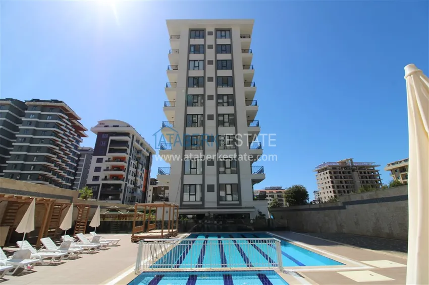 Двухкомнатные квартиры с чистовой отделкой в районе Махмутлар, Алания 2 