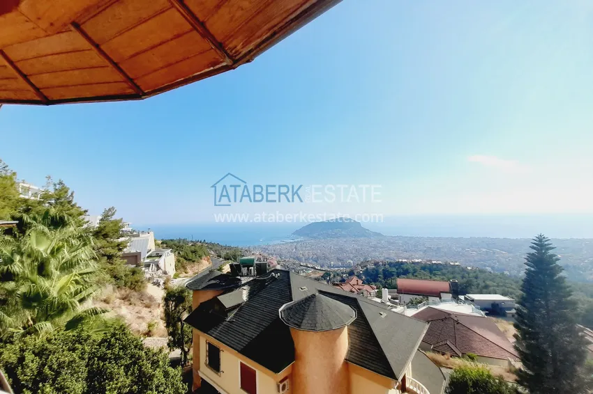 Приобрести Двухэтажная смежная вилла с панорамным видом в районе Бекташ, Алания. Недвижимость подходит для гражданства 26 