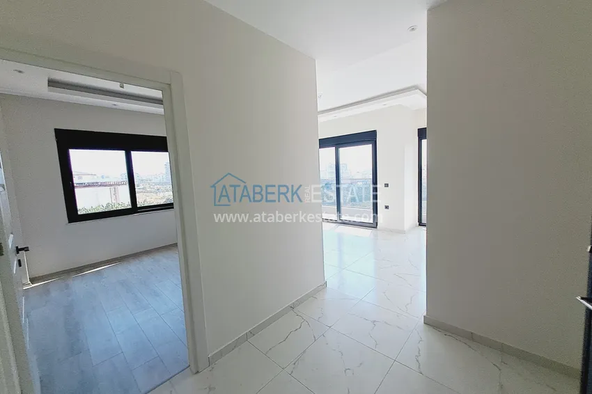 Приобрести Двухкомнатная квартира от инвестора в строящемся жилом комплексе - Махмутлар 2 