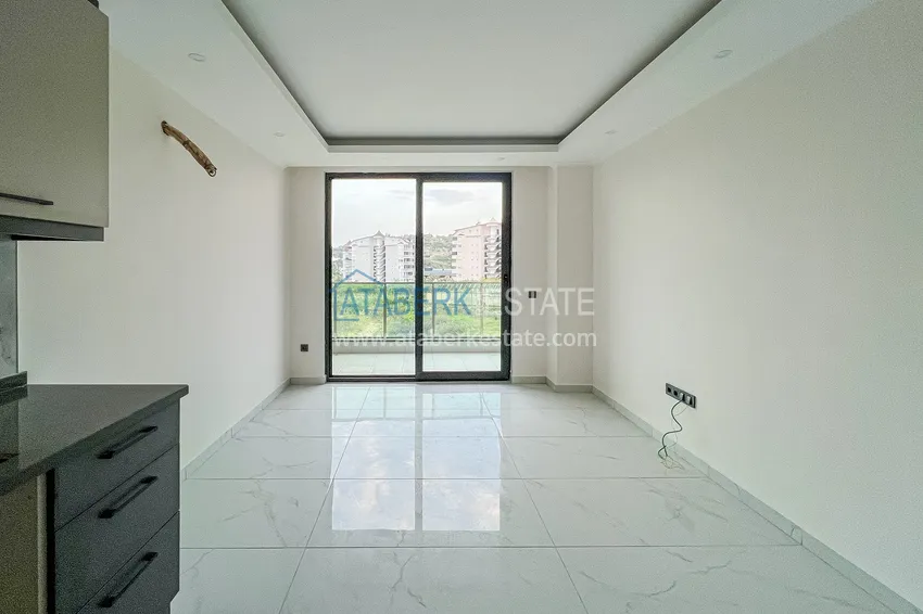 Приобрести Двухкомнатная квартира с чистовой отделкой в комплексе комфорт-класс - район Авсаллар 2