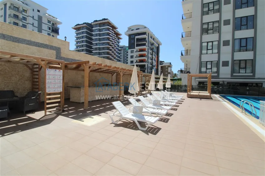 Двухкомнатные квартиры с чистовой отделкой в районе Махмутлар, Алания 4 