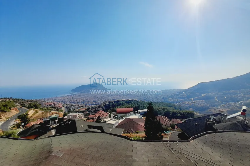 Приобрести Двухэтажная смежная вилла с панорамным видом в районе Бекташ, Алания. Недвижимость подходит для гражданства 27 
