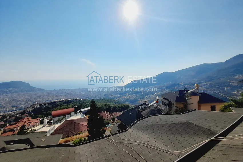 Приобрести Двухэтажная смежная вилла с панорамным видом в районе Бекташ, Алания. Недвижимость подходит для гражданства 28 