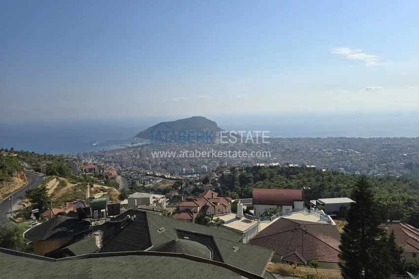 Приобрести Двухэтажная смежная вилла с панорамным видом в районе Бекташ, Алания. Недвижимость подходит для гражданства 29 