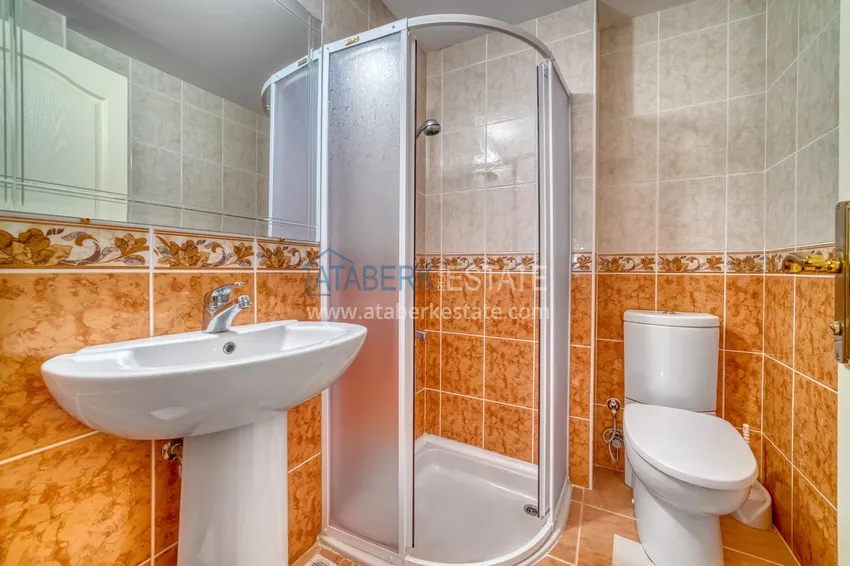 Приобрести Линейная квартира 4+1 с современным интерьером в комплексе на первой береговой в Алании, район Оба 34