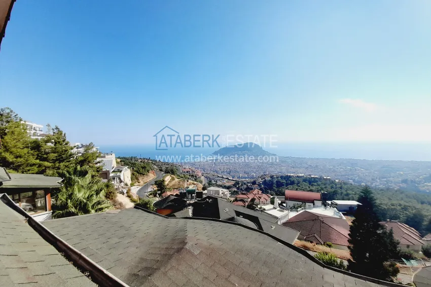 Приобрести Двухэтажная смежная вилла с панорамным видом в районе Бекташ, Алания. Недвижимость подходит для гражданства 30 