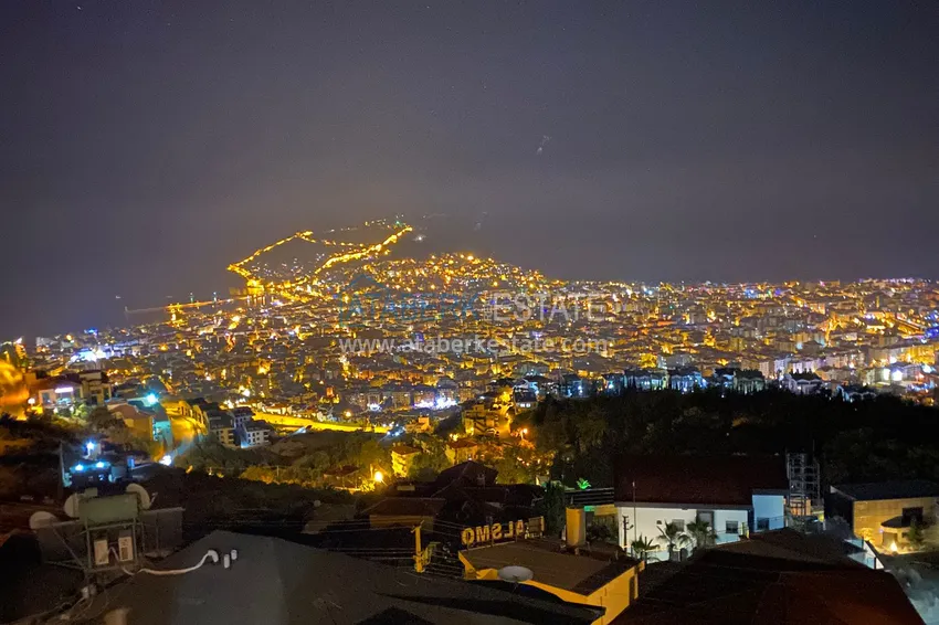 Приобрести Двухэтажная смежная вилла с панорамным видом в районе Бекташ, Алания. Недвижимость подходит для гражданства 34 