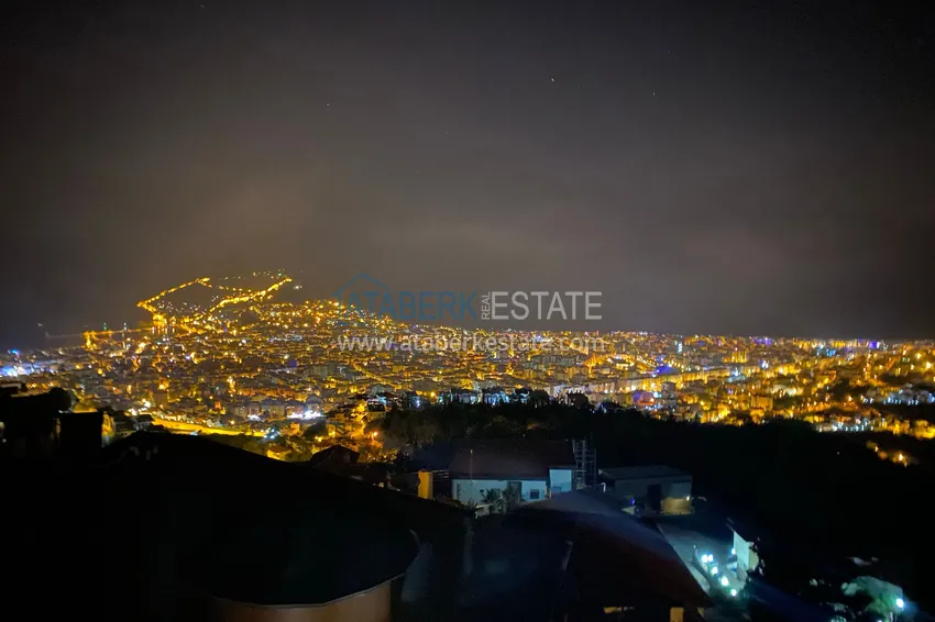 Приобрести Двухэтажная смежная вилла с панорамным видом в районе Бекташ, Алания. Недвижимость подходит для гражданства 35 