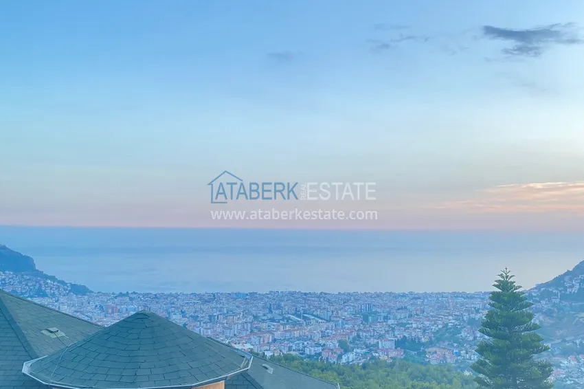 Приобрести Двухэтажная смежная вилла с панорамным видом в районе Бекташ, Алания. Недвижимость подходит для гражданства 36 