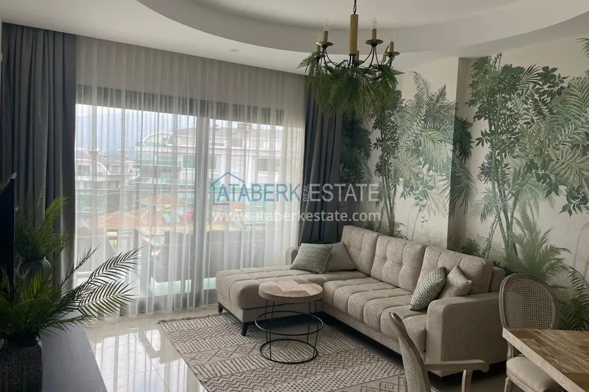 Приобрести Двухкомнатная квартира с мебелью и видом на море. Район Каргыджак, Алания 3 