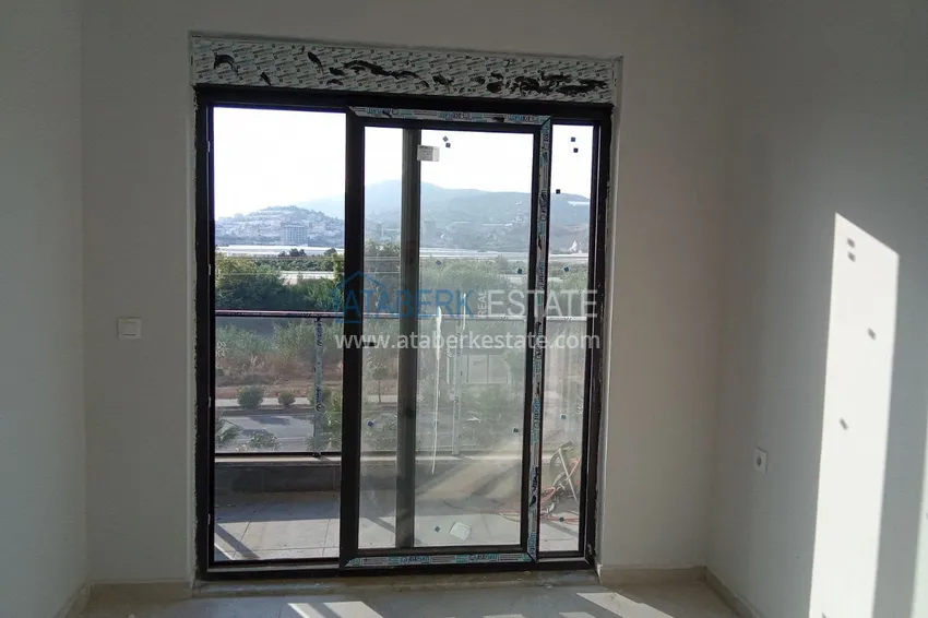 Приобрести Квартира 2+1 с отдельной кухней и видом на горы. Район Демирташ, Алания 3 