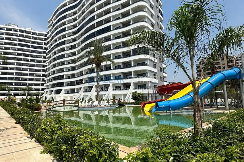 Двухкомнатная квартира в Мерсине, район Арпачбахшиш в 300 метрах от моря 1 