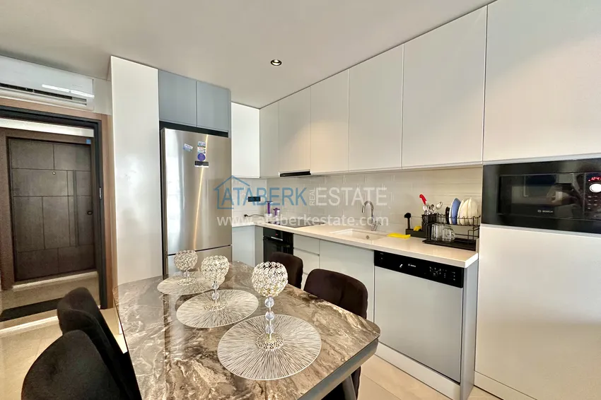 Приобрести Двухкомнатная квартира в современном комплексе – центр Алании 4 