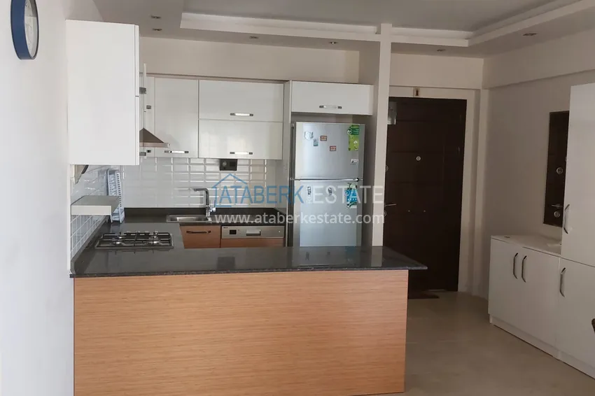 Приобрести Трехкомнатная квартира с мебелью и панорамным видом на море в Чешмели, Мерсин 4 