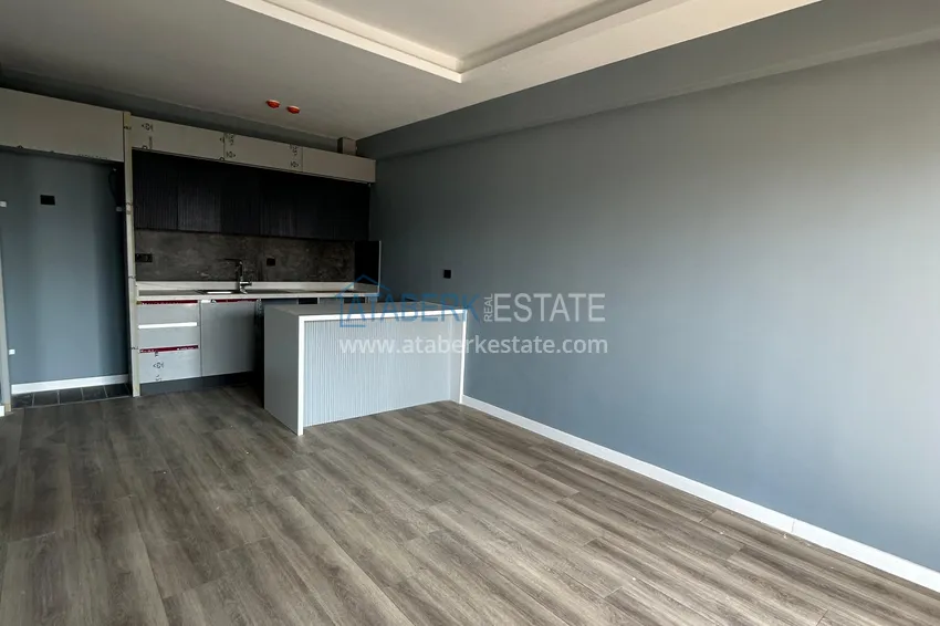 Приобрести Двухкомнатная квартира в Мерсине, район Арпачбахшиш в 300 метрах от моря 4 