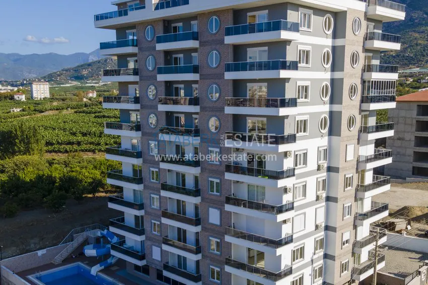 Трехкомнатная квартира под ключ в Махмутларе, с видом на горы и застекленным балконом 4 