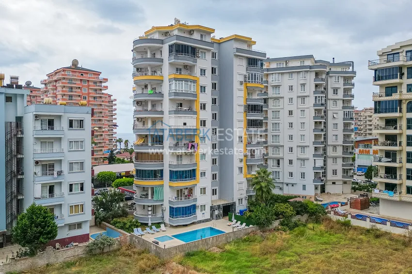 Квартира под ключ с застекленным балконом в Махмутларе на центральной улице, в 150 метрах от моря 4