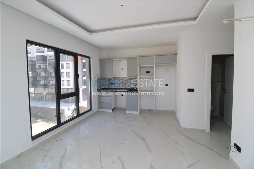 Приобрести Двухкомнатные квартиры с чистовой отделкой в районе Махмутлар, Алания 4 