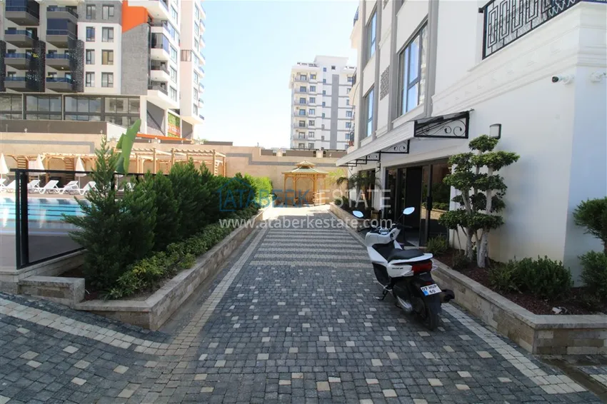 Двухкомнатные квартиры с чистовой отделкой в районе Махмутлар, Алания 9 