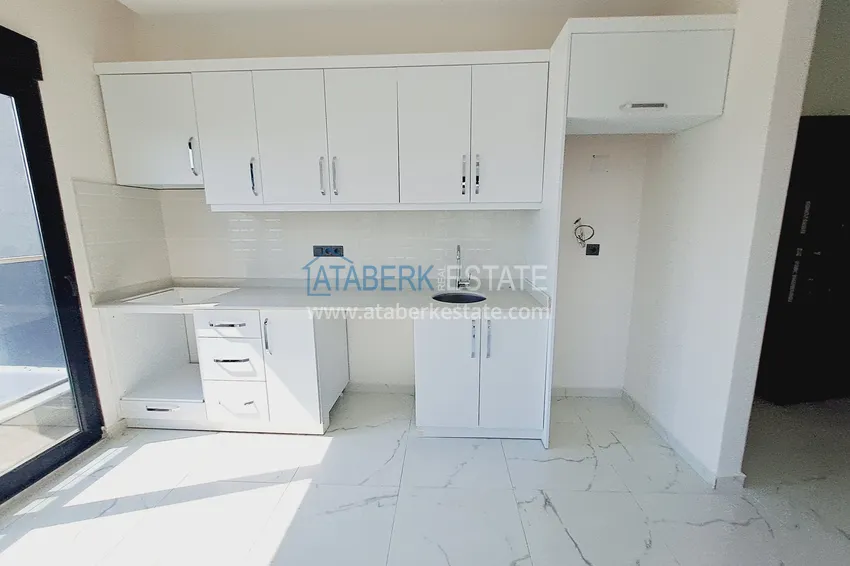 Приобрести Двухкомнатная квартира от инвестора в строящемся жилом комплексе - Махмутлар 5 