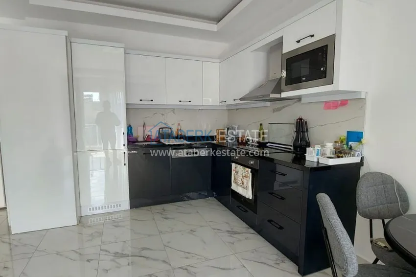 Приобрести Квартира 1+1 меблированная в новом комплексе. Район Авсаллар, Алания 5 