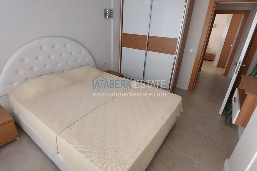 Приобрести Трехкомнатная квартира с мебелью и панорамным видом на море в Чешмели, Мерсин 5 